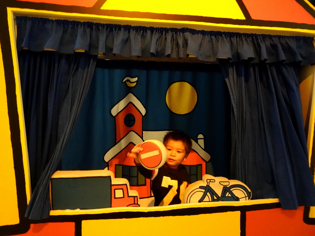 Max at the puppet theatre at the Traffic Room at the upper floor of the Nijntje Winter Museum