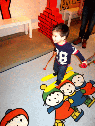 Max on skis at the cross-country skiing area at the Traffic Room at the upper floor of the Nijntje Winter Museum