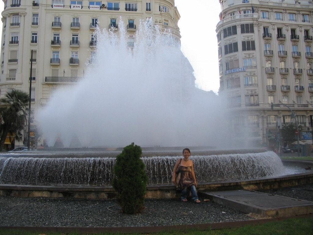 Miaomiao at the fountain at the north side of the Plaça de l`Ajuntament square