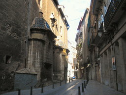 South side of the Iglesia de San Martín y San Antonio church at the Carrer de l`Abadia de Sant Martí street