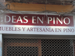 Sign at the front of a shop at the Carrer de Navellos street