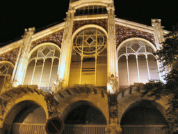 Northeast facade of the Mercado Central market at the Plaça del Mercat square, by night
