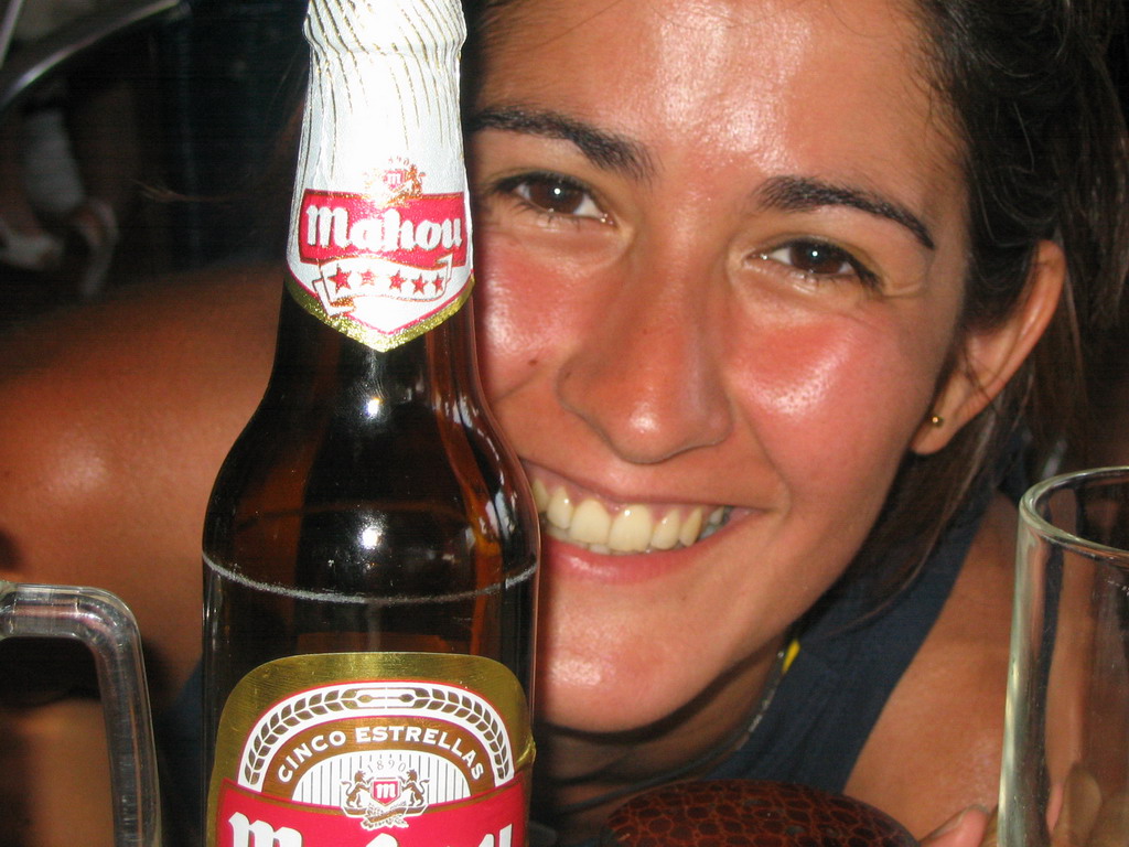 Our friend with a Mahou beer on a terrace at the beach at the east side of Valencia