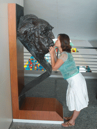 Miaomiao with a bust at the Museu de les Ciències Príncipe Felipe museum at the Ciudad de las Artes y las Ciencias complex