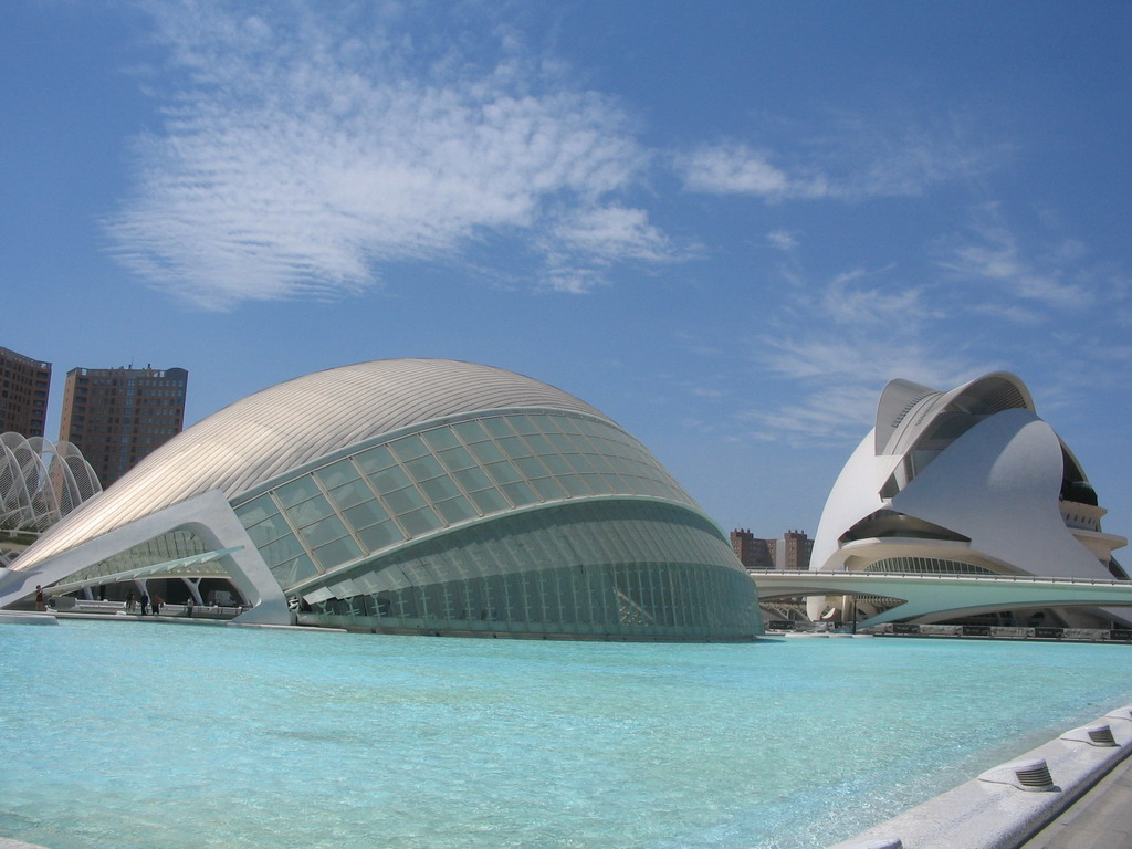 The pond at the northeast side of the Hemisfèric cinema and the Palau de les Arts Reina Sofia art center at the Ciudad de las Artes y las Ciencias complex