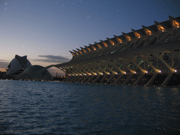 The pond at the southwest side of the Museu de les Ciències Príncipe Felipe museum, the Hemisfèric cinema and the Palau de les Arts Reina Sofia art center at the Ciudad de las Artes y las Ciencias complex, at sunset