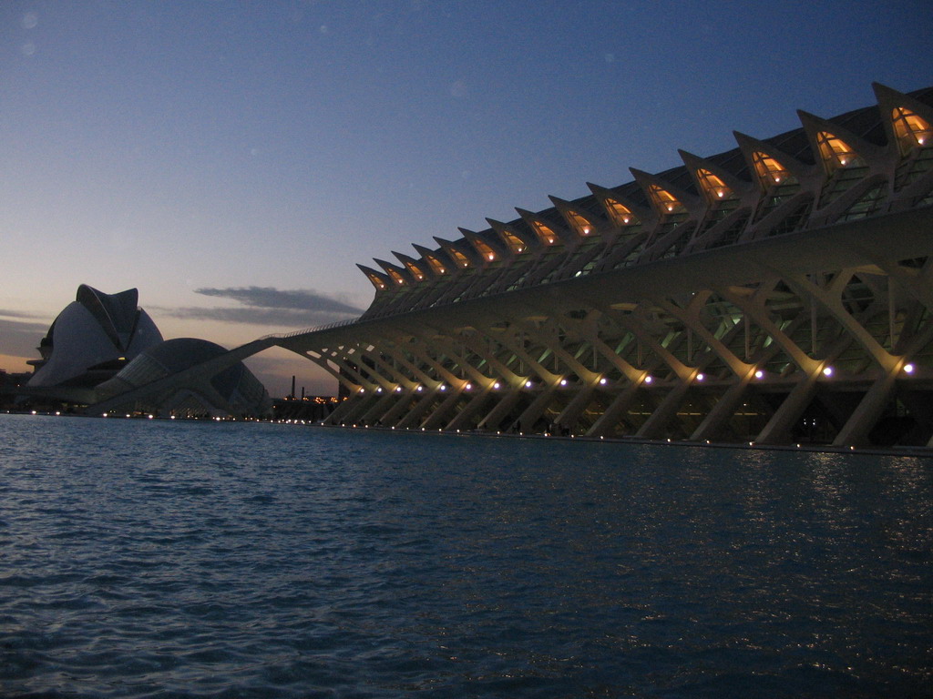 The pond at the southwest side of the Museu de les Ciències Príncipe Felipe museum, the Hemisfèric cinema and the Palau de les Arts Reina Sofia art center at the Ciudad de las Artes y las Ciencias complex, at sunset