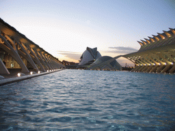 The pond at the southwest side of the Museu de les Ciències Príncipe Felipe museum, the Hemisfèric cinema and the Palau de les Arts Reina Sofia art center at the Ciudad de las Artes y las Ciencias complex, at sunset