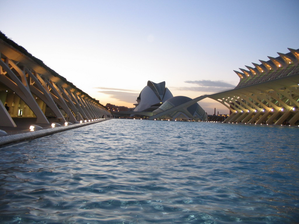 The pond at the southwest side of the Museu de les Ciències Príncipe Felipe museum, the Hemisfèric cinema and the Palau de les Arts Reina Sofia art center at the Ciudad de las Artes y las Ciencias complex, at sunset