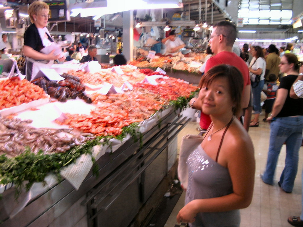Miaomiao with shrimps at a food stall at the Mercado Central market