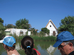 Houses on the shore of the Albufera lagoon, viewed from our tour boat