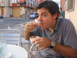 Our friend with an ice cream at the terrace of the Orxateria Joan restaurant