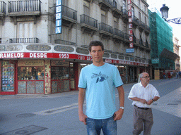 Tim in front of the La Casa De Los Dulces candy shop at the Carrer del Mur de Santa Anna street