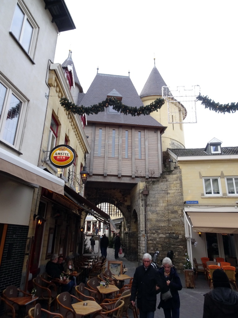 The Grendelpoort gate at the crossing of the Kerkstraat street and the Muntstraat street