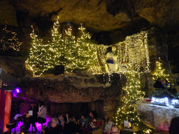 Restaurant, christmas trees and decorations at the christmas market at the Municipal Cave