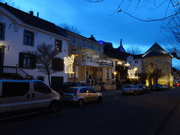 The Neerhem street, the ruins of Valkenburg Castle and the Berkelpoort gate, at sunset