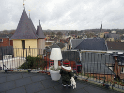Max at the entrance to the ruins of Valkenburg Castle, with a view on the town center with the Grendelpoort gate and the Church of St. Nicolas and St. Barbara