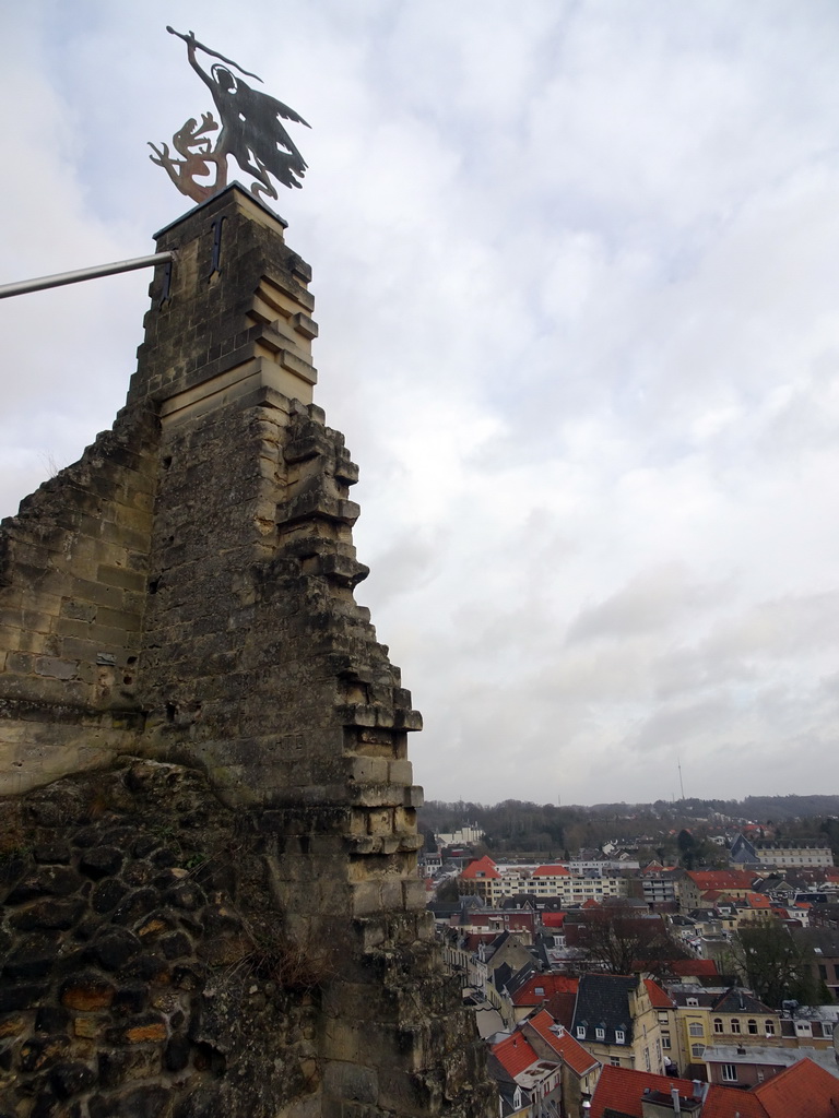 The weather vane at the ruins of Valkenburg Castle and the town center, viewed from a viewing point at the Artillery Room