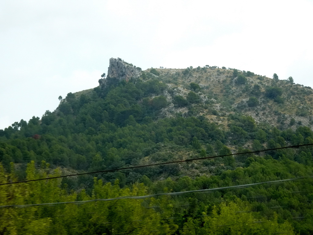 Hills on the south side of the town, viewed from the rental car on the Ma-1110 road from Palma
