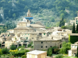 The northeast side of the town center with the tower of the Església de Sant Bartomeu church, viewed from the rental car on the Ma-1110 road