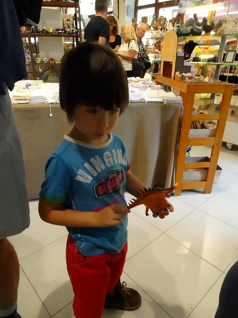 Max in a souvenir shop at the crossing of the Carrer Marquès de Vivot and Carrer de Catalina Homar streets