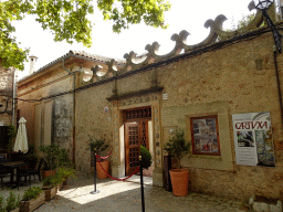 Entrance to the Palau del Rei Sanç palace at the Plaça Cartoixa square