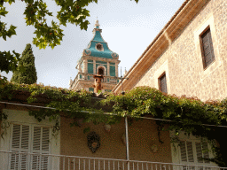 The tower of the Iglesia dela Cartuja church, viewed from the Plaça Cartoixa square