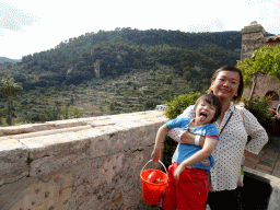 Miaomiao and Max at the garden on the southeast side of the Carthusian Monastery Valldemossa museum, with a view on the southwest side of the town