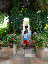 Max with a bucket at the garden of the Museum for Frédéric Chopin and George Sand