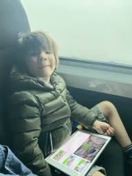 Max watching iPad in the tour bus on the GC-15 road