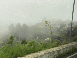 The town center with the Iglesia De San Bartolome De Las Lagunetas church, viewed from the tour bus on the GC-155 road