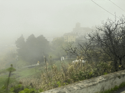 The town center with the Iglesia De San Bartolome De Las Lagunetas church, viewed from the tour bus on the GC-155 road