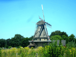 The Oerse Molen windmill at the Hoogeind street, viewed from the car