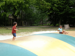 Max and a friend on the trampoline at the large playground at Zoo Veldhoven