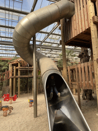 Max on the slide at the playground in the Bamboo Jungle hall at Zoo Veldhoven
