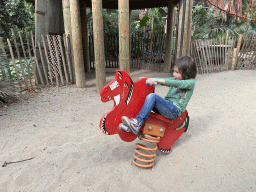 Max on a rocking horse at the playground in the Bamboo Jungle hall at Zoo Veldhoven