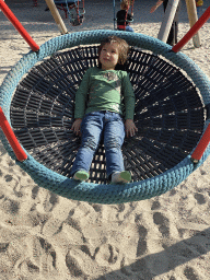 Max on a swing at the large playground at Zoo Veldhoven