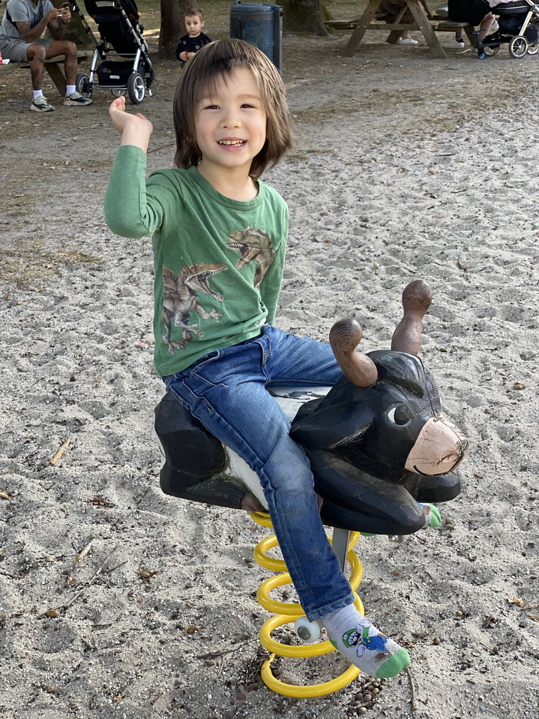 Max on a rocking horse at the large playground at Zoo Veldhoven