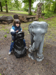 Max with statues of Donald Duck and an Elephant at Zoo Veldhoven