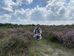 Miaomiao and Max with purple heather on the north side of the Posbank hill