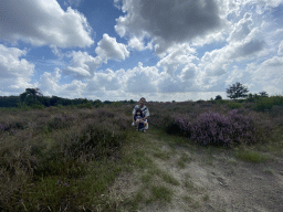 Miaomiao and Max with purple heather on the north side of the Posbank hill