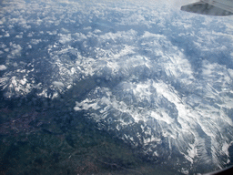 View on the Alps mountains, from the plane from Eindhoven