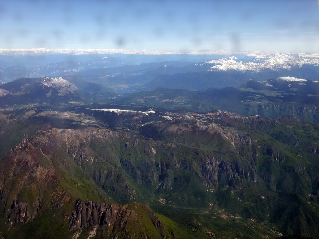 View on the south side of the Alps mountains, from the plane from Eindhoven