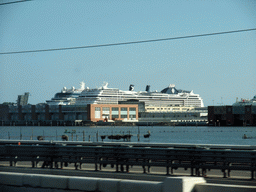 View on the Ponte della Libertà bridge and boats at the Bacino Stazione Marittima harbor from the train from Mestre to Venice