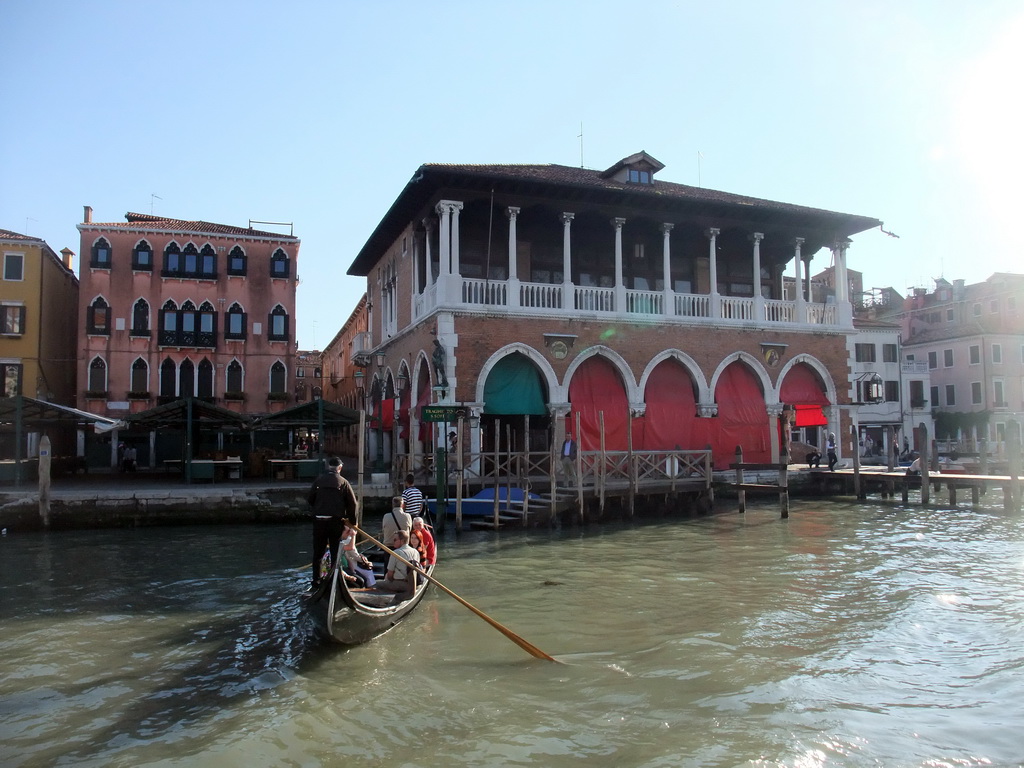 Gondola and the Rialto Pescheria fish market, viewed from the Canal Grande ferry