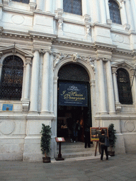 Miaomiao in front of the Scuola Grande di San Teodoro building at the Campo San Salvador square