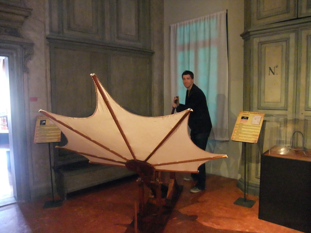 Tim with a flying machine at the `Il Genio di Leonardo da Vinci` exhibition in the Scuola Grande di San Rocco building