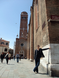 Tim at the Campo dei Frari square with the southeast side of the Basilica di Santa Maria Gloriosa dei Frari church and its Campanile Tower