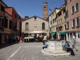 The Campo San Tomà square with the Scoletta dei Calegheri building and the top of the Campanile Tower of the Basilica di Santa Maria Gloriosa dei Frari church