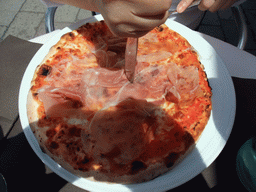 Pizza at a restaurant at the Campo Santo Stefano square